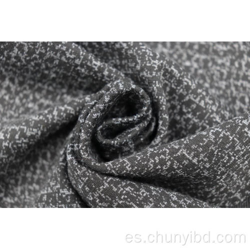 Tela jacquard de lunares en blanco y negro